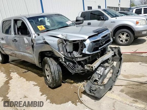 2015 Toyota Tacoma with VIN 3TMLU4EN7FM181570, listed as a Copart auction lot 53056985 with Not Provided miles and Salvage Title. Bid and sale history available at DreamBid. Image 13.