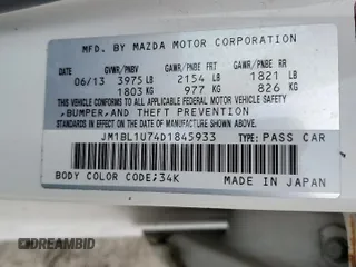 2013 Mazda 3 i Sport z VIN JM1BL1U74D1845933, wystawiony jako Copart lot #60819365 z przebiegiem 153 226 mil mil oraz Czysty tytuł • Clean title. Historia ofert i sprzedaży dostępna na DreamBid. Obrazek 13.