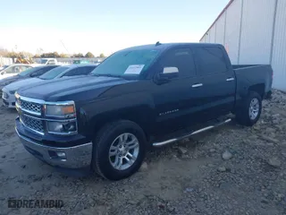 2014 Chevrolet Silverado 1500 LT with VIN 3GCPCREC0EG321309, listed as a IAAI auction lot 41411069 with 174,689 mi miles. Bid and sale history available at carsss.com. Image 2.