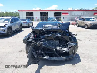 2018 Chevrolet Camaro 1LT z VIN 1G1FB1RX8J0184852, wystawiony jako IAAI lot #42268638 z przebiegiem 99 610 mil mil oraz . Historia ofert i sprzedaży dostępna na DreamBid. Obrazek 6.