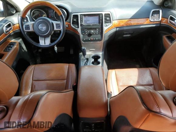 2011 Jeep Grand Cherokee Overland with VIN 1J4RR6GG3BC718723, listed as a Copart auction lot 64975275 with 272,922 mi miles and Salvage title. Bid and sale history available at DreamBid. Image 8.