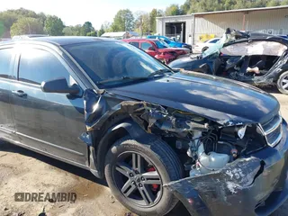 2008 Dodge Avenger SXT with VIN 1B3LC56K08N219664, listed as a IAAI auction lot 40523495 with 347,666 mi miles. Bid and sale history available at carsss.com. Image 6.