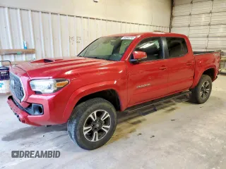 2019 Toyota Tacoma SR with VIN 3TMCZ5AN0KM278617, listed as a Copart auction lot 58948245 with 128,736 mi miles and Salvage title. Bid and sale history available at DreamBid. Image 1.