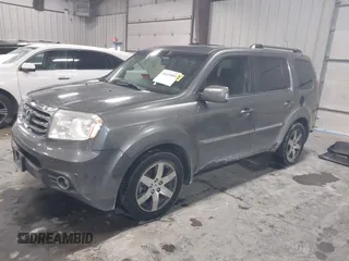 2012 Honda Pilot Touring with VIN 5FNYF4H98CB030879, listed as a IAAI auction lot 41619003 with 201,131 mi miles. Bid and sale history available at carsss.com. Image 17.