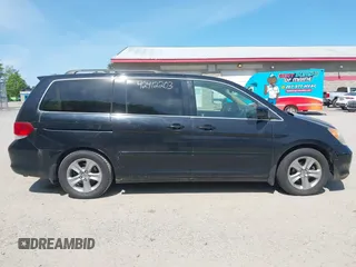 2009 Honda Odyssey Touring с VIN 5FNRL38999B018272, выставлен на аукционе IAAI как лот 42412203 с пробегом 154 987 миль миль и . История ставок и продаж доступна на DreamBid. Изображение 14.