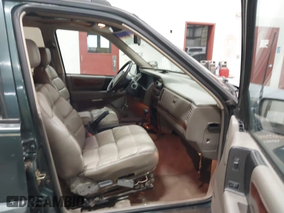 1994 Jeep Grand Cherokee Limited с VIN 1J4GZ78Y8RC198596, выставлен на аукционе IAAI как лот 41943421 с пробегом 329 828 миль миль и . История ставок и продаж доступна на DreamBid. Изображение 5.