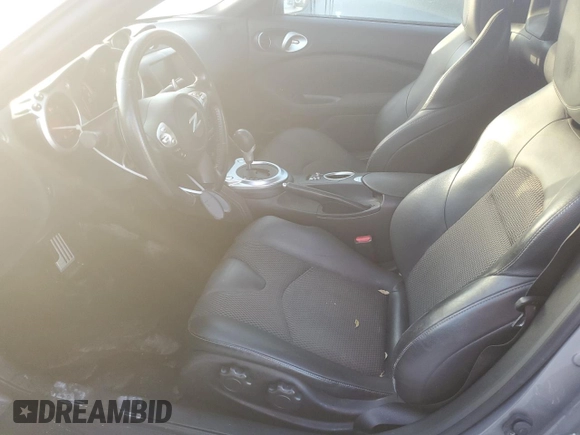 2014 Nissan 370Z Touring with VIN JN1AZ4FH4EM620092, listed as a Copart auction lot 77439254 with 38,662 mi miles and Salvage Title. Bid and sale history available at DreamBid. Image 7.