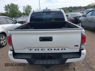 2023 Toyota Tacoma SR z VIN 3TMCZ5AN1PM637609, wystawiony jako IAAI lot #40345917 z przebiegiem 12 614 mil mil oraz . Historia ofert i sprzedaży dostępna na DreamBid. Obrazek 16.
