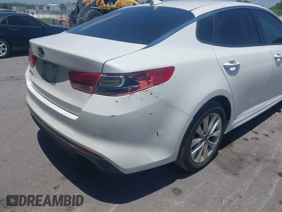 2018 Kia Optima S with VIN 5XXGT4L35JG251681, listed as a IAAI auction lot 42302319 with 154,612 mi miles and . Bid and sale history available at DreamBid. Image 6.