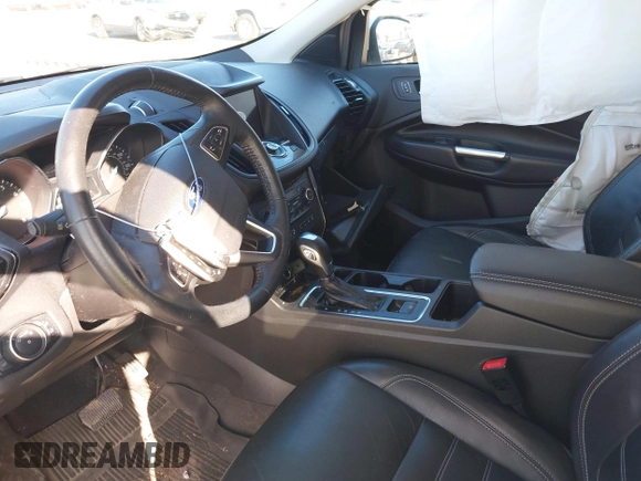 2019 Ford Escape Titanium with VIN 1FMCU9J91KUB21842, listed as a IAAI auction lot 41632210 with 104,900 mi miles. Bid and sale history available at carsss.com. Image 5.