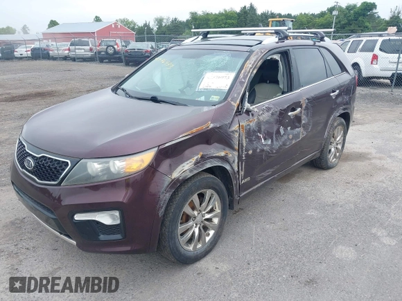 2012 Kia Sorento SX with VIN 5XYKWDA2XCG237950, listed as a IAAI auction lot 42576973 with 205,951 mi miles and . Bid and sale history available at DreamBid. Image 2.