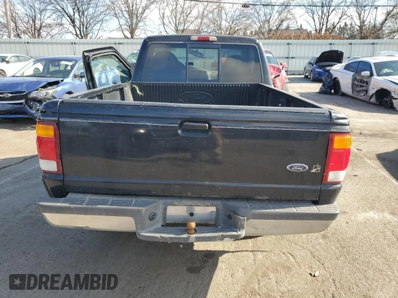 1999 Ford Ranger XL with VIN 1FTYR10V9XUB87056, listed as a Copart auction lot 43989795 with 193,980 mi miles and Salvage Title. Bid and sale history available at carsss.com. Image 6.