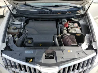 2012 Lincoln MKT EcoBoost with VIN 2LMHJ5AT4CBL53611, listed as a Copart auction lot 46493425 with 77,072 mi miles and Salvage Title. Bid and sale history available at DreamBid. Image 12.