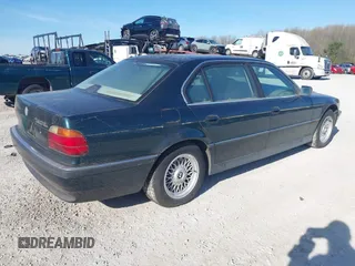 1998 BMW 7 Series 740il with VIN WBAGJ8323WDM13455, listed as a IAAI auction lot 41888636 with 1 mi miles. Bid and sale history available at carsss.com. Image 4.