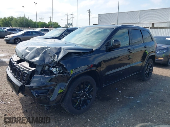 2021 Jeep Grand Cherokee Laredo E with VIN 1C4RJEAG0MC571375, listed as a IAAI auction lot 42087648 with 29,358 mi miles and . Bid and sale history available at DreamBid. Image 18.