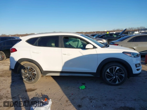 2019 Hyundai Tucson Sport with VIN KM8J33AL1KU838499, listed as a IAAI auction lot 41317832 with 71,594 mi miles. Bid and sale history available at carsss.com. Image 13.