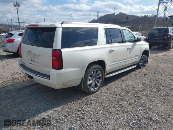 2015 Chevrolet Suburban LTZ with VIN 1GNSKKKC4FR304532, listed as a IAAI auction lot 41899860 with 123,624 mi miles. Bid and sale history available at carsss.com. Image 4.