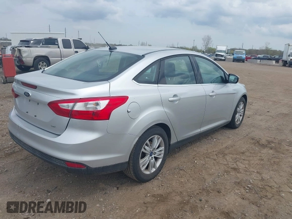 2012 Ford Focus SEL with VIN 1FAHP3H29CL300165, listed as a IAAI auction lot 42137804 with 96,644 mi miles. Bid and sale history available at carsss.com. Image 4.