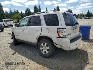 2012 Ford Escape Hybrid with VIN 1FMCU5K37CKA44510, listed as a Copart auction lot 63316175 with 156,892 mi miles and Salvage title. Bid and sale history available at DreamBid. Image 2.
