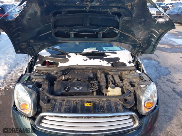 2013 MINI Cooper Countryman with VIN WMWZB3C57DWR35705, listed as a IAAI auction lot 41620080 with 197,884 mi miles. Bid and sale history available at carsss.com. Image 10.