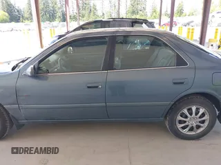 2000 Toyota Camry CE z VIN JT2BG22KXY0406984, wystawiony jako IAAI lot #42344436 z przebiegiem 234 729 mil mil oraz . Historia ofert i sprzedaży dostępna na DreamBid. Obrazek 14.