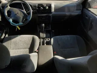 2001 Isuzu Rodeo S with VIN 4S2CK58W014302125, listed as a Copart auction lot 76425614 with 204,350 mi miles and Salvage title. Bid and sale history available at DreamBid. Image 8.