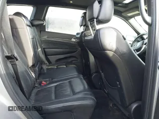 2016 Jeep Grand Cherokee Limited 75th Anniversary with VIN 1C4RJFBG5GC401277, listed as a IAAI auction lot 41119644 with 156,658 mi miles and . Bid and sale history available at DreamBid. Image 8.