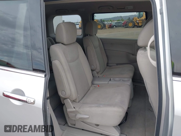 2015 Nissan Quest SV with VIN JN8AE2KP8F9125445, listed as a IAAI auction lot 42040196 with 125,218 mi miles. Bid and sale history available at carsss.com. Image 8.