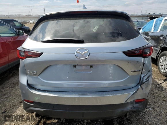 2023 Mazda CX-5 S Premium with VIN JM3KFBDM8P0203834, listed as a Copart auction lot 52496815 with 54,306 mi miles and Non Repairable. Bid and sale history available at DreamBid. Image 6.