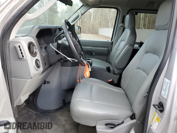 2013 Ford Econoline Passenger XL with VIN 1FMNE1BWXDDB17125, listed as a Copart auction lot 77066034 with 30,726 mi miles and Salvage title. Bid and sale history available at DreamBid. Image 7.