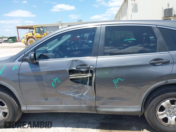 2013 Honda CR-V LX with VIN 3CZRM3H37DG708916, listed as a IAAI auction lot 42450090 with 118,002 mi miles and . Bid and sale history available at DreamBid. Image 14.