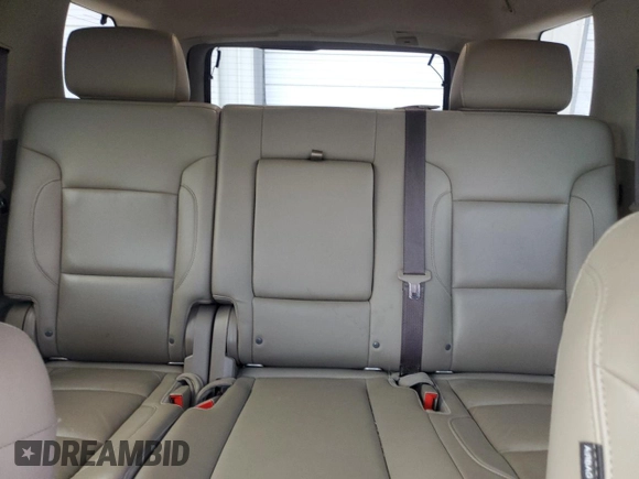 2019 Chevrolet Tahoe LT with VIN 1GNSKBKC2KR349527, listed as a Copart auction lot 58496695 with 128,590 mi miles and Salvage title. Bid and sale history available at DreamBid. Image 10.