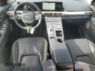 2020 Hyundai NEXO z VIN KM8J74A69LU006933, wystawiony jako Copart lot #51453844 z przebiegiem 139 442 mil mil oraz Tytuł czysty. Historia ofert i sprzedaży dostępna na DreamBid. Obrazek 8.