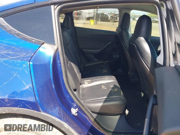 2020 Tesla Model Y Long Range with VIN 5YJYGDEF4LF000494, listed as a IAAI auction lot 41894856 with 118,638 mi miles and . Bid and sale history available at DreamBid. Image 8.