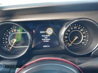 2022 Jeep Gladiator Texas Trail с VIN 1C6HJTAG7NL148818, выставлен на аукционе IAAI как лот 41870129 с пробегом 23 342 миль миль и . История ставок и продаж доступна на DreamBid. Изображение 7.