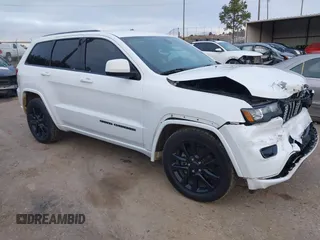 2018 Jeep Grand Cherokee Laredo E with VIN 1C4RJEAG6JC339813, listed as a IAAI auction lot 41239612 with 109,443 mi miles. Bid and sale history available at carsss.com. Image 1.