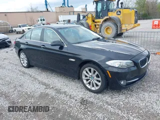 2013 BMW 5 Series 528i xDrive with VIN WBAXH5C50DD108058, listed as a IAAI auction lot 41874340 with 146,054 mi miles. Bid and sale history available at carsss.com. Image 1.