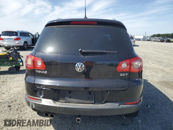 2011 Volkswagen Tiguan SEL w/Premium Navi with VIN WVGAV7AX2BW550158, listed as a Copart auction lot 57649235 with 133,346 mi miles and Clean title. Bid and sale history available at DreamBid. Image 6.
