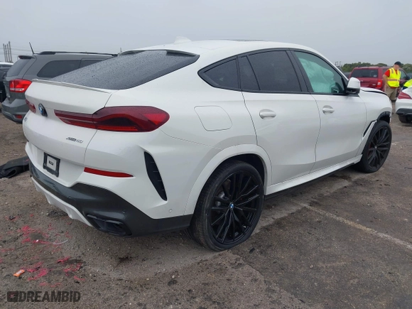 2021 BMW X6 xDrive40i with VIN 5UXCY6C00M9F88215, listed as a IAAI auction lot 41646498 with 43,587 mi miles. Bid and sale history available at carsss.com. Image 4.