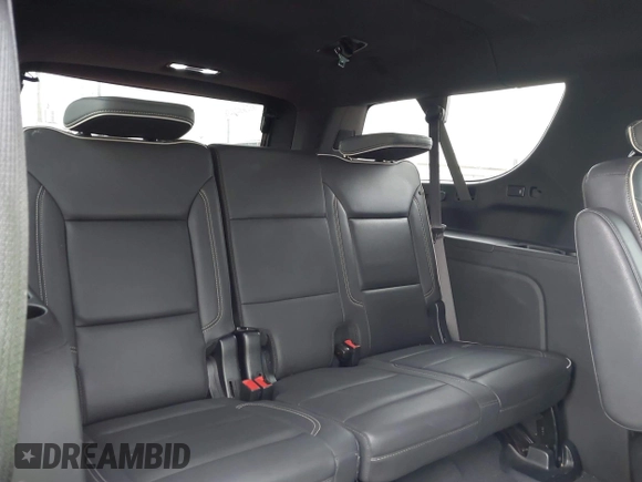 2023 Chevrolet Suburban Premier z VIN 1GNSCFKD8PR362870, wystawiony jako IAAI lot #42148476 z przebiegiem 54 983 mil mil oraz . Historia ofert i sprzedaży dostępna na DreamBid. Obrazek 18.
