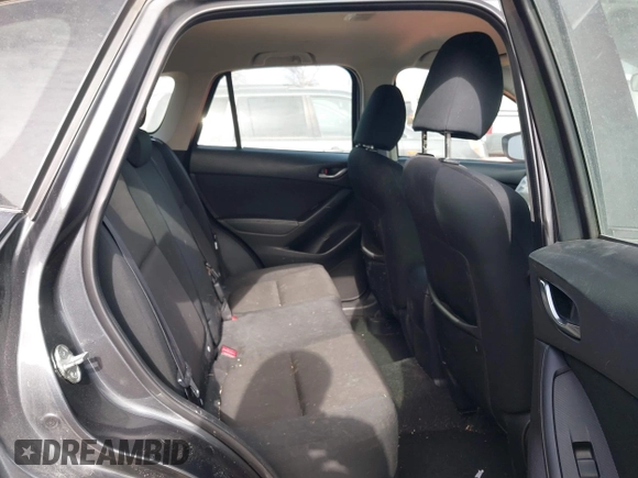 2016 Mazda CX-5 Sport with VIN JM3KE4BY0G0623365, listed as a IAAI auction lot 41525002 with 127,674 mi miles and . Bid and sale history available at carsss.com. Image 8.