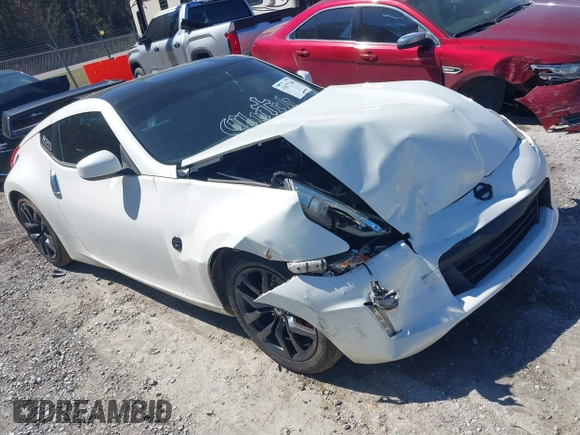 2015 Nissan 370Z Sport with VIN JN1AZ4EH9FM443719, listed as a IAAI auction lot 41677286 with 87,967 mi miles and . Bid and sale history available at DreamBid. Image 1.