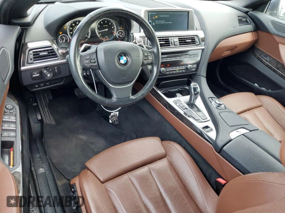 2012 BMW 6 Series 650i z VIN WBALZ3C50CDL70497, wystawiony jako Copart lot #82409164 z przebiegiem 17 982 mil mil oraz Szkoda całkowita • Salvage title. Historia ofert i sprzedaży dostępna na DreamBid. Obrazek 8.