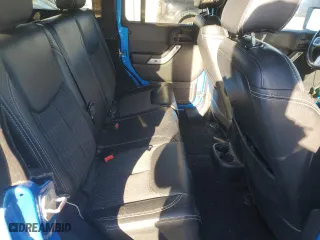 2015 Jeep Wrangler Unlimited Sport with VIN 1C4BJWDG1FL573349, listed as a Copart auction lot 86879394 with 96,773 mi miles and Salvage Title. Bid and sale history available at carsss.com. Image 10.