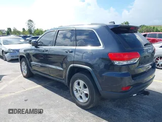 2014 Jeep Grand Cherokee Laredo with VIN 1C4RJEAG0EC179563, listed as a IAAI auction lot 39799427 with 209,169 mi miles and . Bid and sale history available at DreamBid. Image 3.