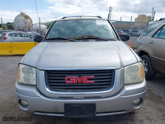 2004 GMC Envoy SLE with VIN 1GKDT13S842353029, listed as a IAAI auction lot 41938513 with 210,990 mi miles. Bid and sale history available at carsss.com. Image 6.