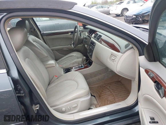 2011 Buick Lucerne CXL with VIN 1G4HC5EM0BU134274, listed as a IAAI auction lot 42217978 with 137,821 mi miles and . Bid and sale history available at carsss.com. Image 5.