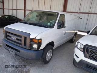 2014 Ford Econoline Cargo Commercial with VIN 1FTNE1EL7EDB06431, listed as a IAAI auction lot 42028232 with 175,707 mi miles. Bid and sale history available at carsss.com. Image 2.