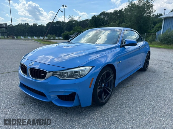 2015 BMW M4 with VIN WBS3U9C56FP967640, listed as a Copart auction lot 63641785 with 31,516 mi miles and Salvage title. Bid and sale history available at DreamBid. Image 2.