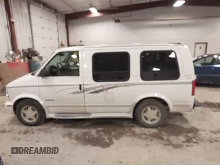1998 Chevrolet Astro Cargo Van YF7 Upfitter with VIN 1GBDM19W1WB121821, listed as a IAAI auction lot 41463704 with 141,724 mi miles. Bid and sale history available at carsss.com. Image 14.